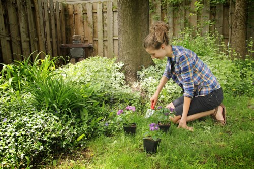 Happy clients enjoying their garden by Gardener Twickenham